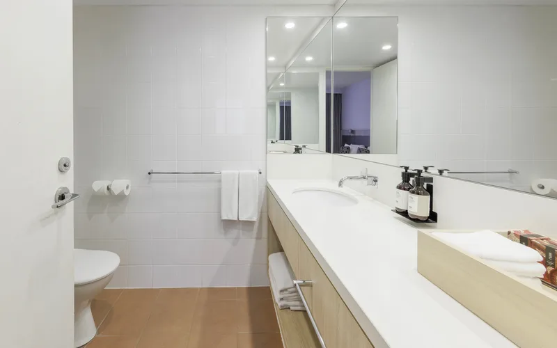 One-bedroom apartment lounge at Emu Walk Apartments in Yulara, self-catering base for Uluru tours, Northern Territory
